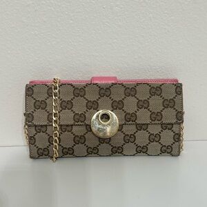 Authentic Gucci monogram canvas and pink leather wallet on chain